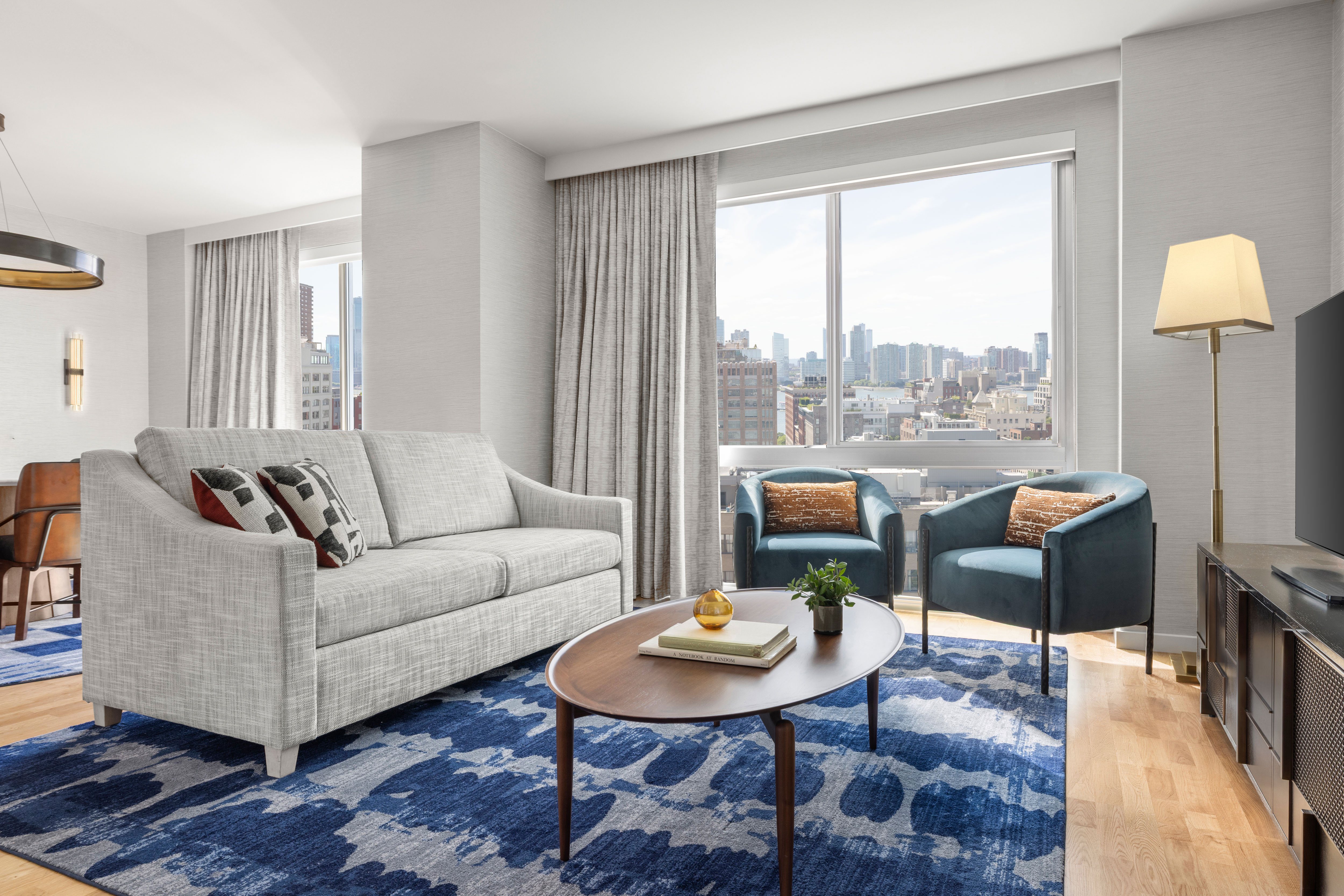 Tribeca Penthouse living room with skyline views at Sheraton Tribeca